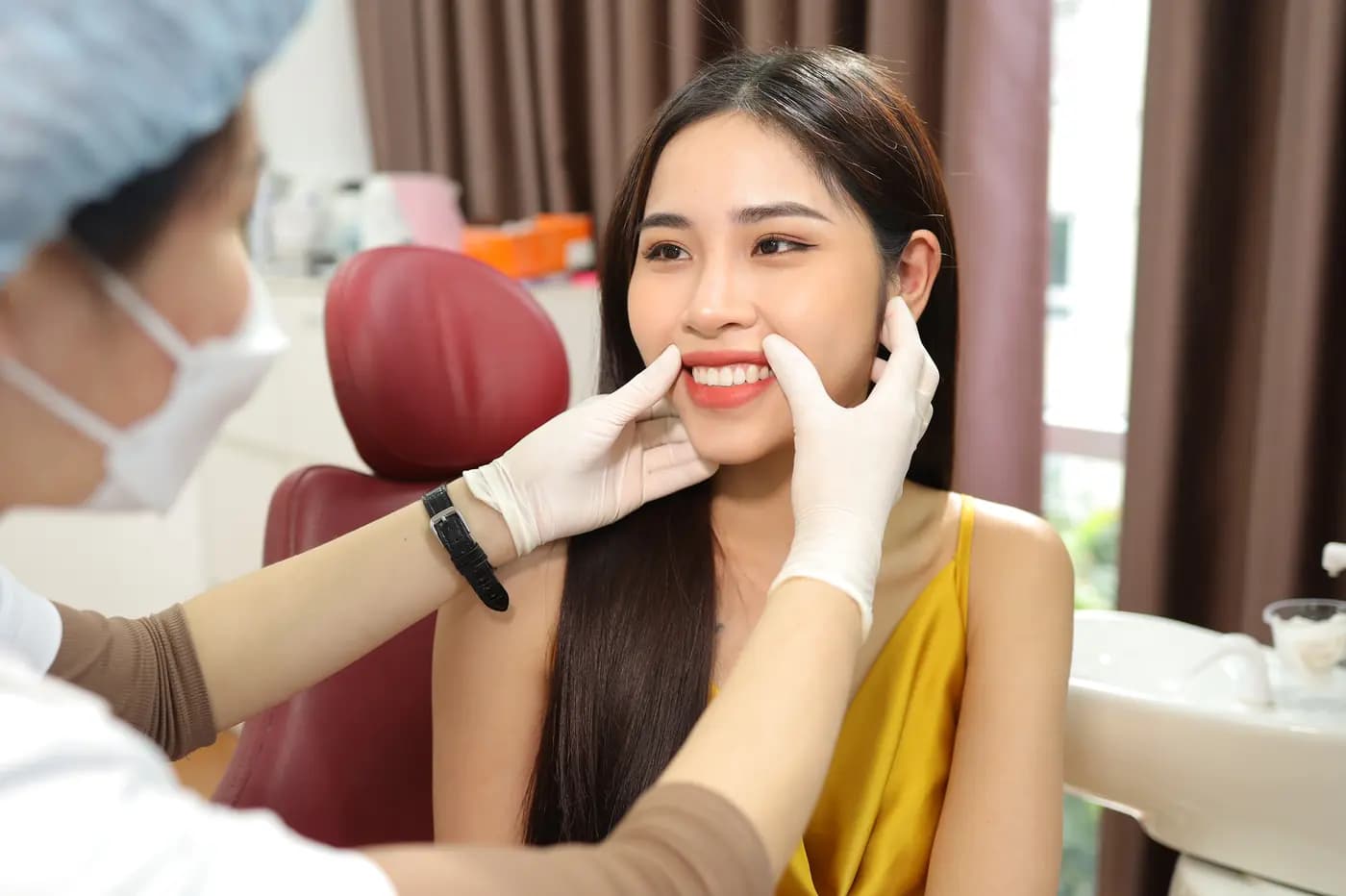 Checking a patient's bite and smile